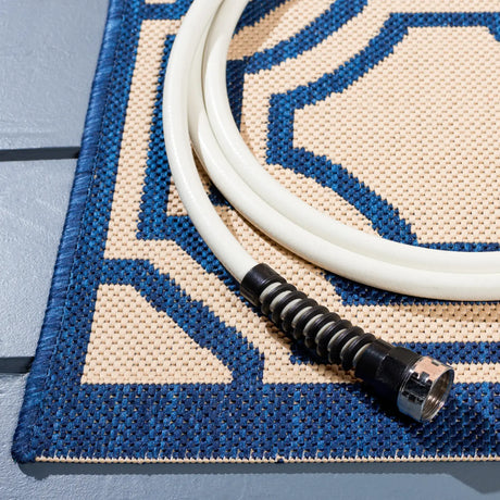 Safavieh Courtyard 5'-3" x 7'-7" Rug in Beige / Navy