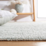 Safavieh Easy Care 5'-0" x 8'-0" Rug in Light Blue / Ivory