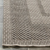 Safavieh Courtyard 5'-3" x 7'-7" Rug in Beige / Black