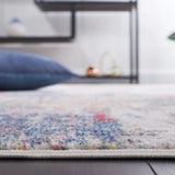Safavieh Phoenix 500 4'-5" x 6'-5" Rug in Ivory / Blue Rust