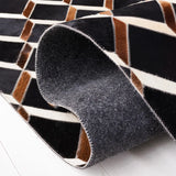 Safavieh Studio Leather 4'-0" x 6'-0" Rug in Black / Brown