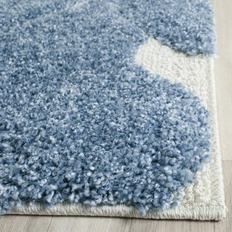 Safavieh Florida Shag 9'-6" x 13'-0" Rug in Light Blue / Cream