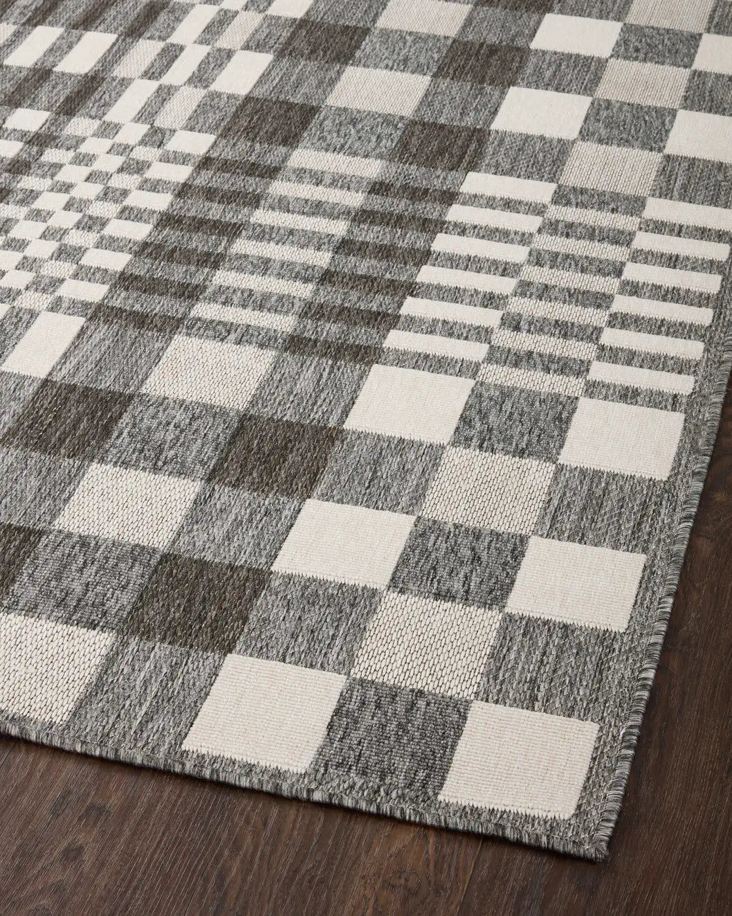 Loloi Rainier Rai-04 Ivory/Pebble Rug - angled corner on wood