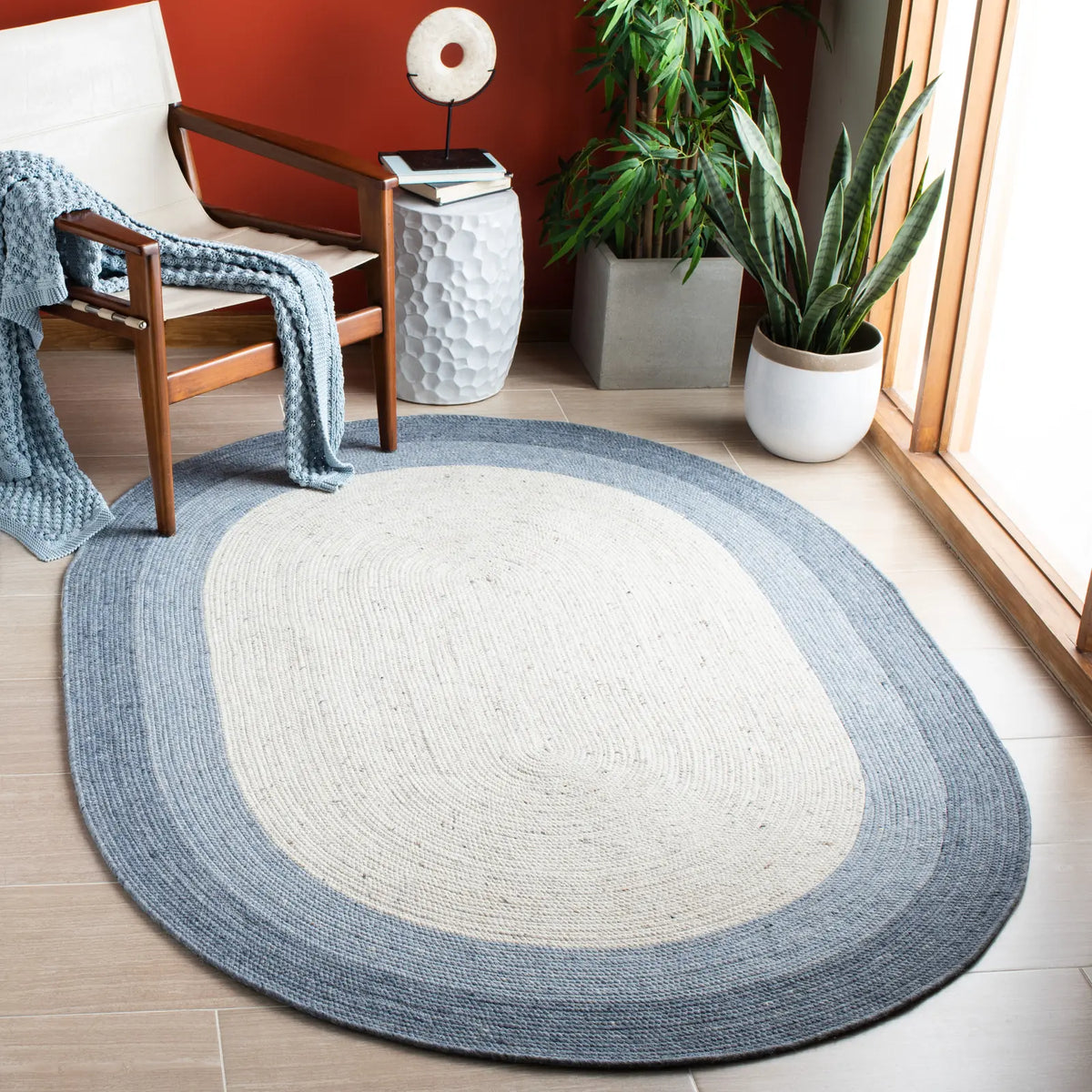 Safavieh Braided 5'-0" x 7'-0" Rug in Ivory / Blue