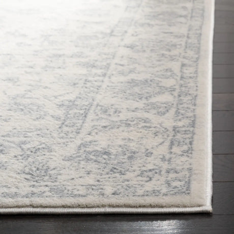 Safavieh Carnegie 5'-1" x 7'-6" Rug in Cream / Light Grey