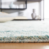 Safavieh Casablanca 4'-0" x 6'-0" Rug in Turquoise / Ivory