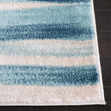 Safavieh Skyler 4'-5" x 6'-5" Rug in Beige / Navy
