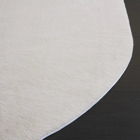 Safavieh Faux Rabbit Fur 5'-0" x 7'-0" Rug in Beige