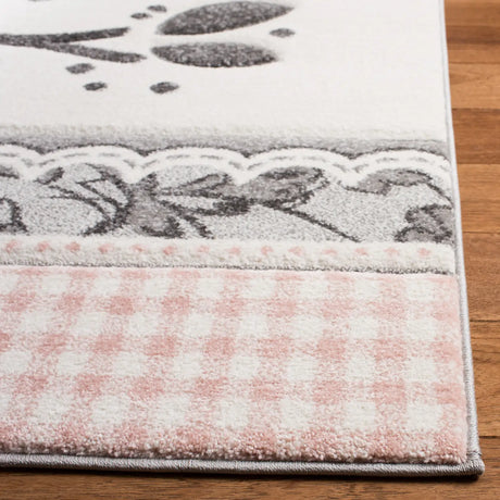 Safavieh Carousel Kids 100 4'-0" x 6'-0" Rug in Pink / Ivory