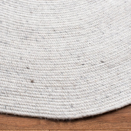 Safavieh Braided 5'-0" x 7'-0" Rug in Light Beige