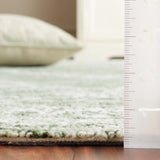 Safavieh Metro 4'-0" x 6'-0" Rug in Green / Ivory