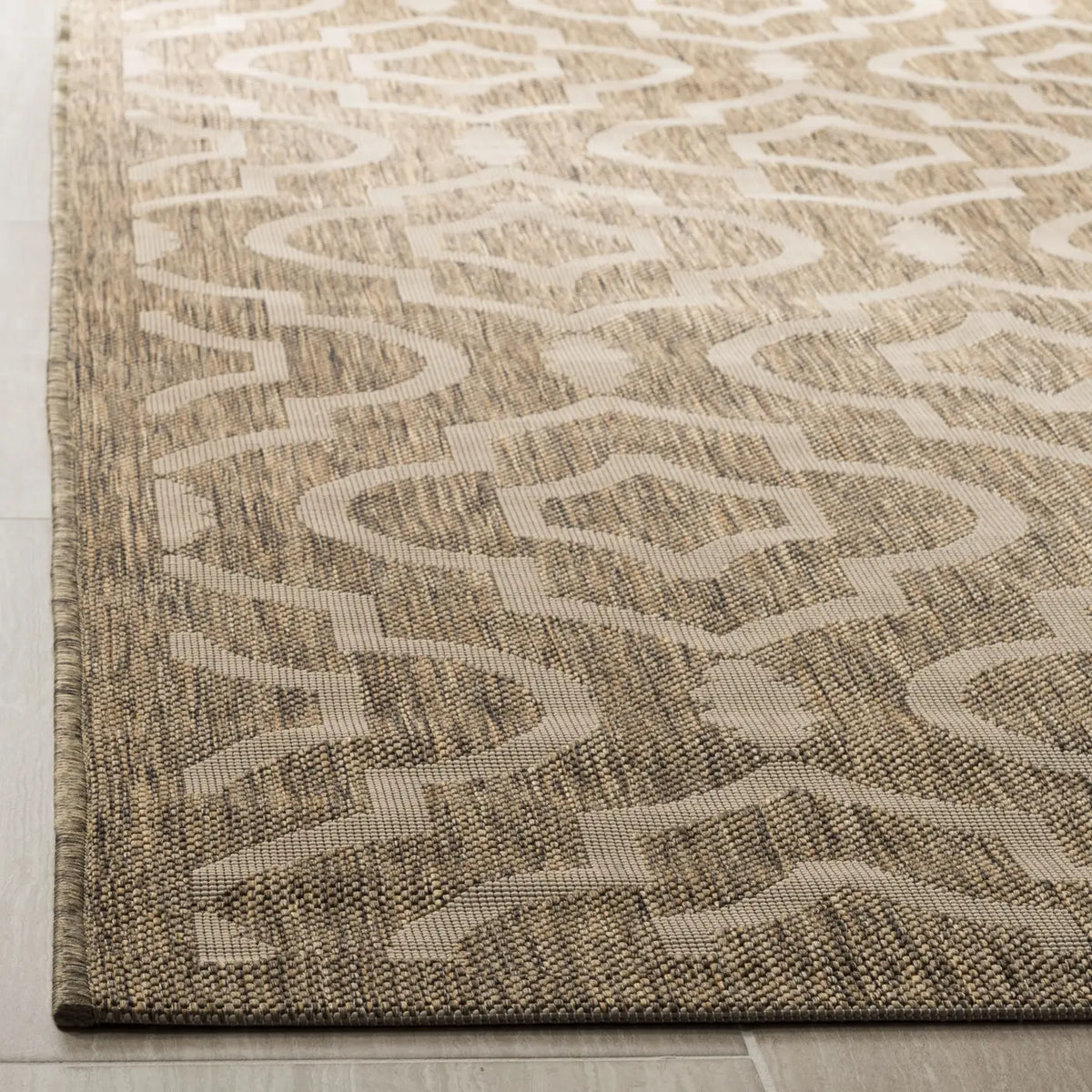 Safavieh Courtyard 5'-3" x 7'-7" Rug in Brown / Bone
