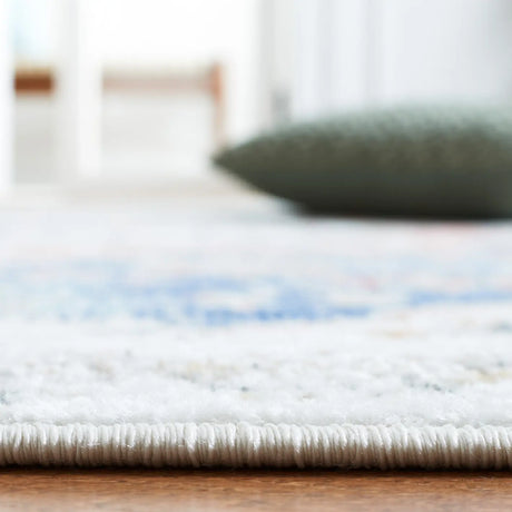 Safavieh Phoenix 500 4'-5" x 6'-5" Rug in Ivory / Blue