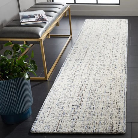 Safavieh Ebony 2'-3" x 9'-0" Rug in Blue / Ivory