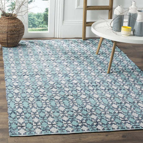 Safavieh Montauk 5'-0" x 8'-0" Rug in Turquoise / Multi