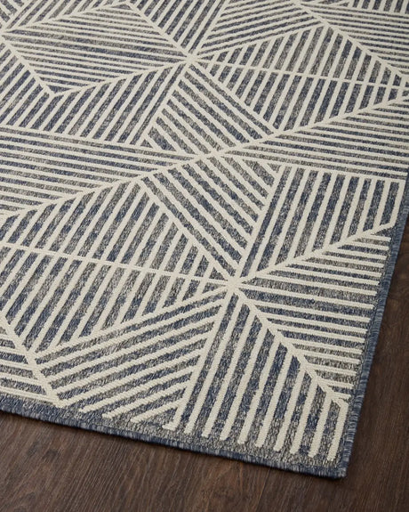 Loloi Rainier Rai-03 Denim/Ivory Rug - angled corner on wood