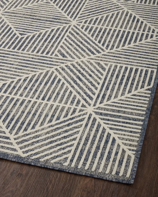 Loloi Rainier Rai-03 Denim/Ivory Rug - angled corner on wood
