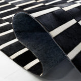 Safavieh Studio Leather 4'-0" x 6'-0" Rug in Black / Beige