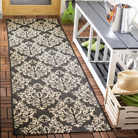 Safavieh Courtyard 2'-3" x 8'-0" Rug in Black / Creme
