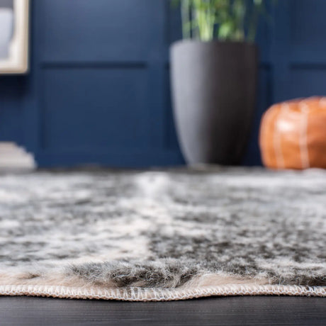 Safavieh Faux Cowhide 3'-0" x 5'-0" Rug in Beige / Black