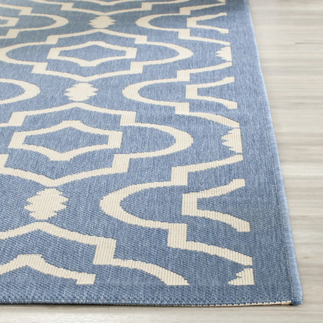 Safavieh Courtyard 5'-3" x 7'-7" Rug in Blue / Beige