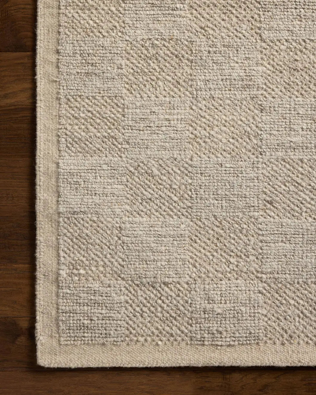 Loloi Alina ALN-01 Contemporary Hand Woven Dove Rug - corner on wood