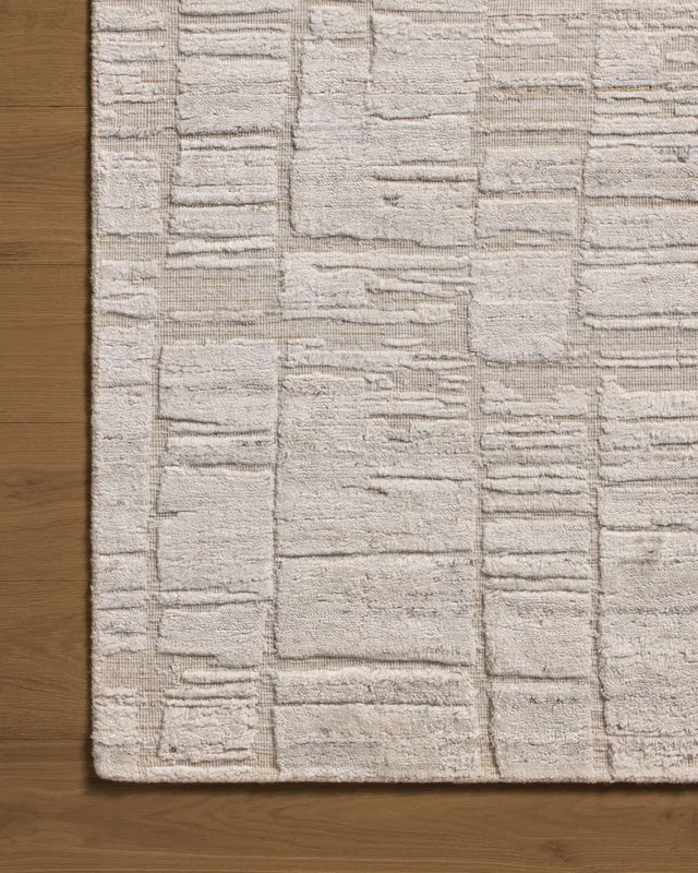 Jean Stoffer x Loloi Daniel DAN-01 Antique Ivory Rug - corner on wood