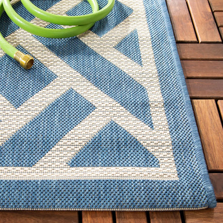 Safavieh Courtyard 5'-3" x 7'-7" Rug in Blue / Light Beige