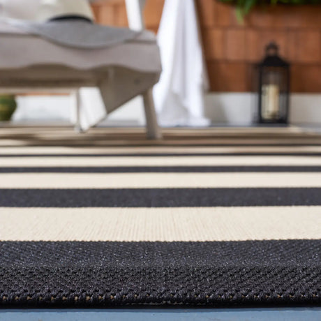 Safavieh Courtyard 4'-0" x 5'-7" Rug in Beige / Black