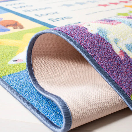 Safavieh Kids Playhouse 200 5'-5" x 7'-7" Rug in Beige / Blue