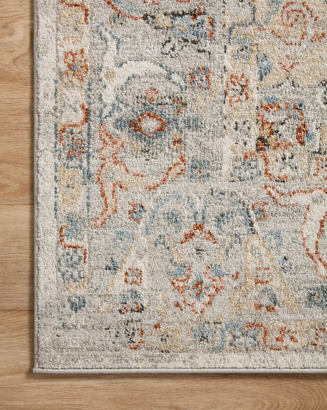 Loloi Odette Odt-09 Ivory/Multi Rug - corner on wood