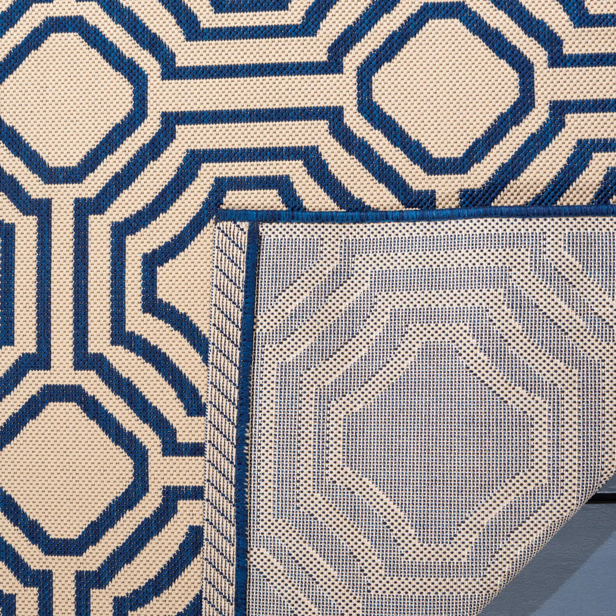 Safavieh Courtyard 5'-3" x 7'-7" Rug in Beige / Navy