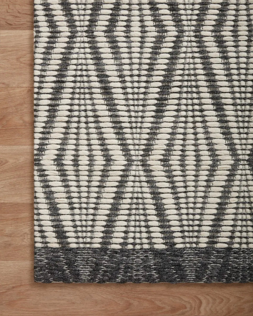 Loloi Kenzie Knz-01 Ivory/Charcoal Rugs - corner on wood