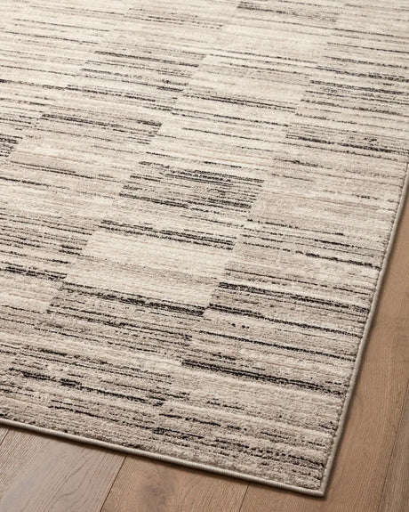 Loloi Darby Dar-01 Charcoal/Sand Rug - angled corner on wood