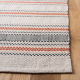 Safavieh Montauk 4'-0" x 6'-0" Rug in Red / Beige