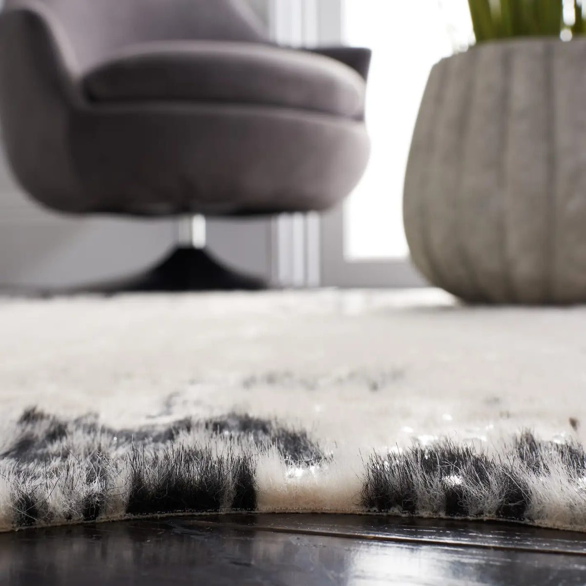 Safavieh Faux Cowhide 5'-0" x 6'-5" Rug in Beige / Black