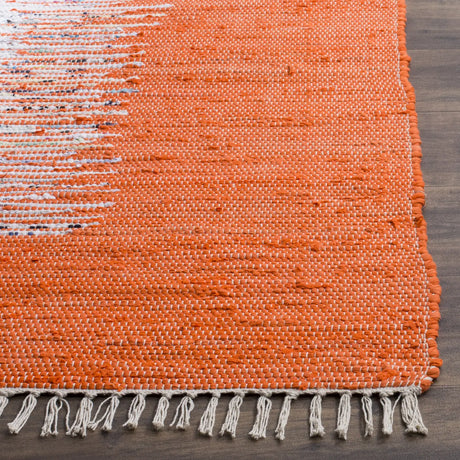 Safavieh Montauk 4'-0" x 6'-0" Rug in Ivory / Orange