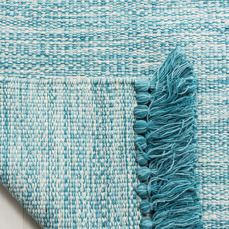 Safavieh Montauk 5'-0" x 8'-0" Rug in Turquoise