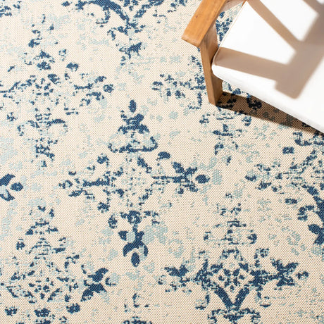 Safavieh Courtyard 4'-5" x 6'-5" Rug in Ivory / Navy