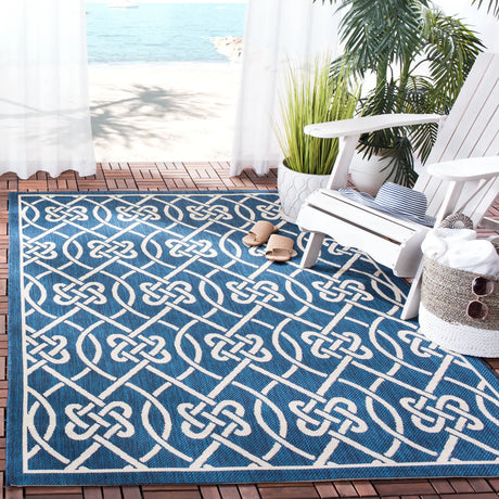 Safavieh Courtyard 5'-3" x 7'-7" Rug in Navy / Light Beige