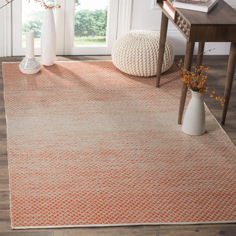Safavieh Montauk 4'-0" x 6'-0" Rug in Orange / Ivory