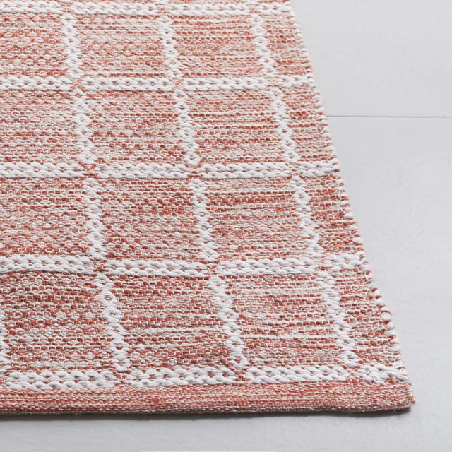 Safavieh Montauk 4'-0" x 6'-0" Rug in Orange / Ivory