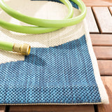 Safavieh Courtyard 5'-3" x 7'-7" Rug in Beige / Navy