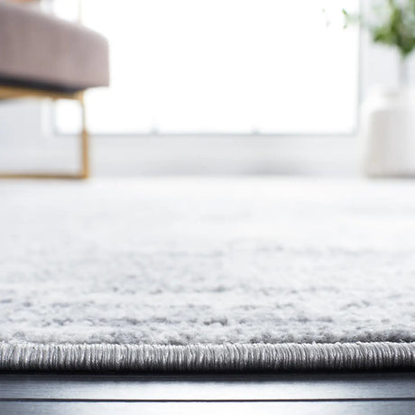 Safavieh Jasper 100 4'-0" x 6'-0" Rug in Grey / Ivory