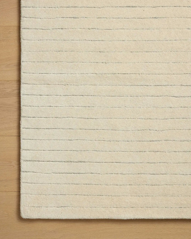 Chris Loves Julia x Loloi Henry HEY-01 Ivory / Dove Rug - corner on wood