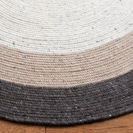 Safavieh Braided 5'-0" x 7'-0" Rug in Charcoal / Ivory