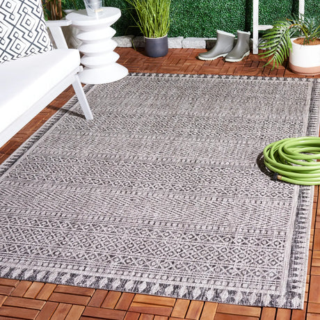 Safavieh Courtyard 5'-3" x 7'-7" Rug in Black / Beige