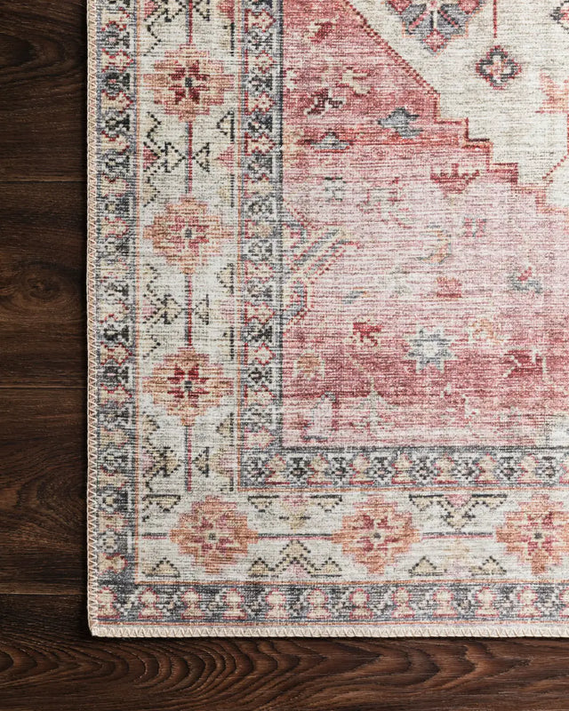 Loloi Skye Sky-02 Ivory/Berry Rugs - corner on wood