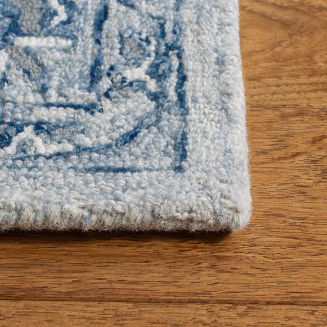 Safavieh Micro-Loop 4'-0" x 6'-0" Rug in Light Blue / Ivory
