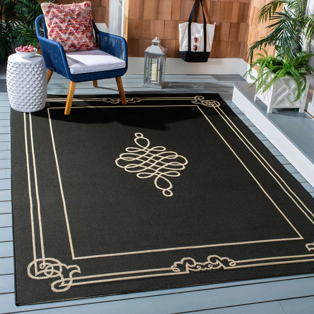 Safavieh Courtyard 4'-0" x 5'-7" Rug in Black / Creme